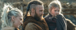 viking man and a woman with a child