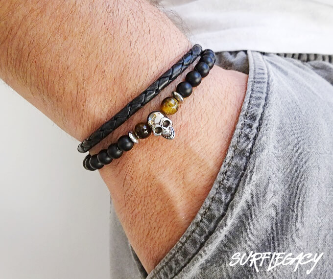 skull bead bracelet stacked with braided bracelet
