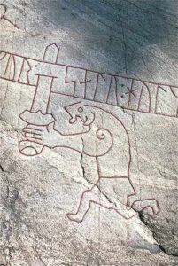 A depiction of Sigurd with Gram on the Ramsund carving, dated to around the year 1030