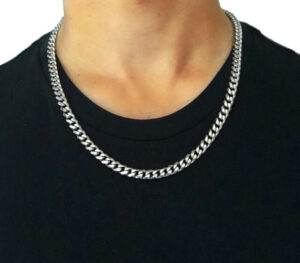 silver chain necklace worn by a male