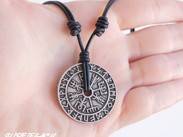 VEGVISIR NECKLACE ON SLIP KNOT PICTURED ON HAND